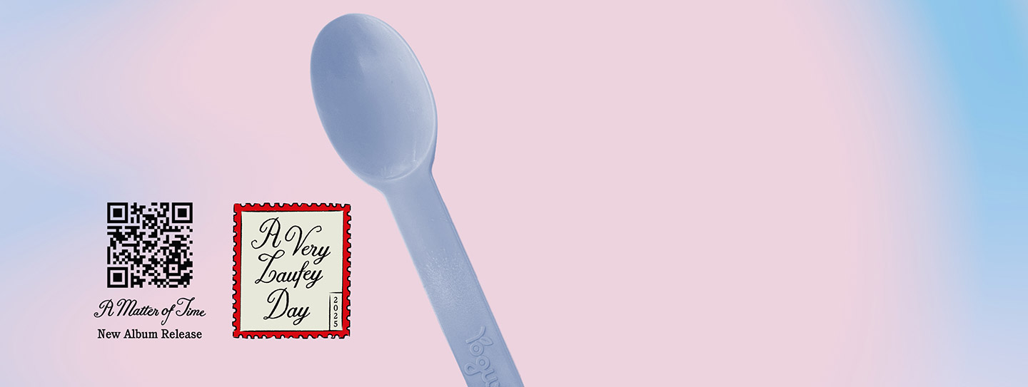 A giant blue spoon from Yogurtland.