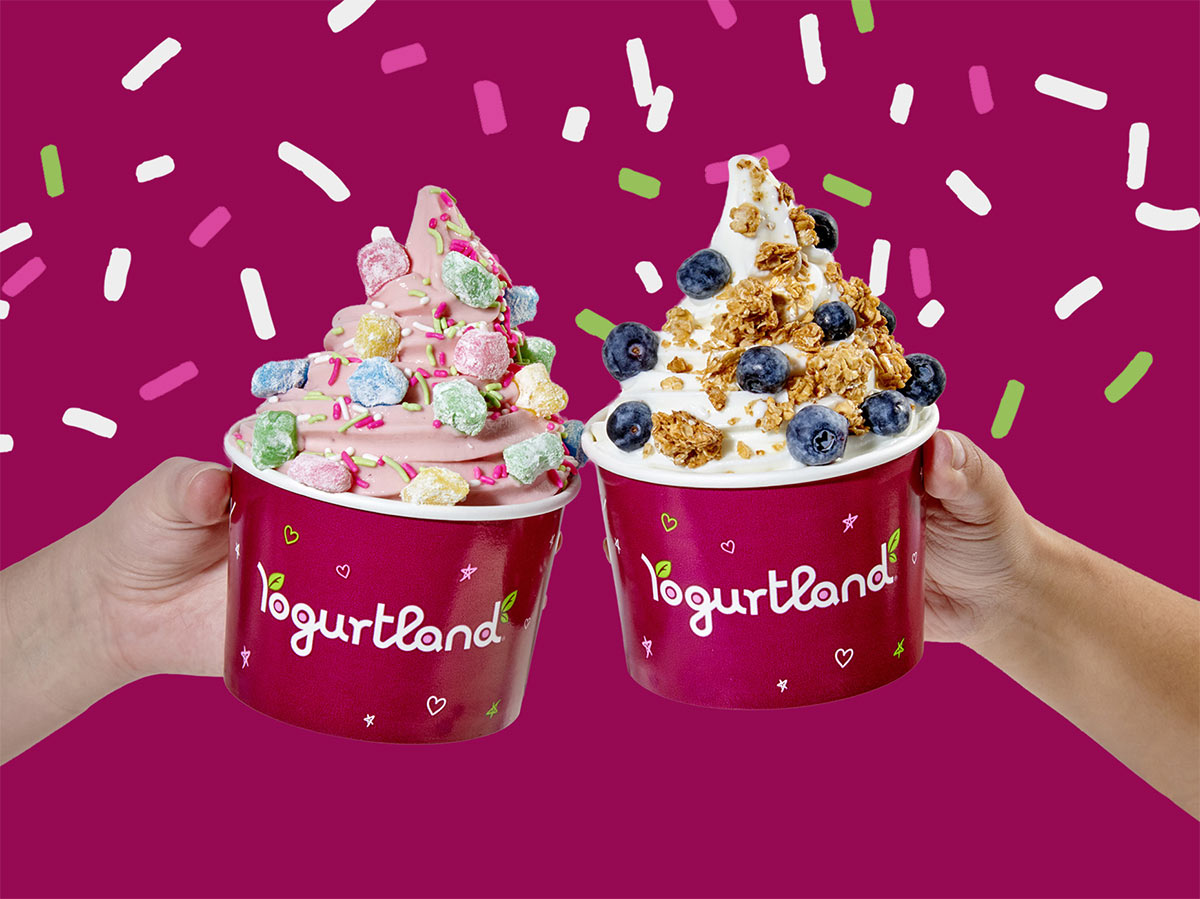 Two Yogurtland frozen yogurt cups with an American flag