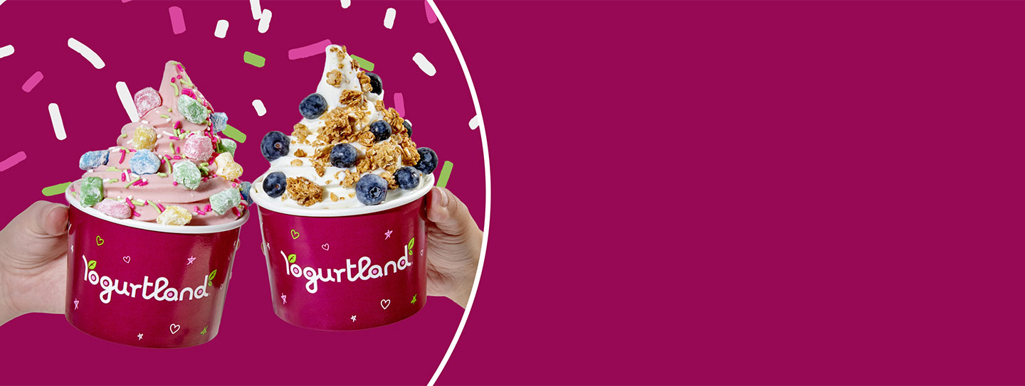 Two Yogurtland frozen yogurt cups with an American flag