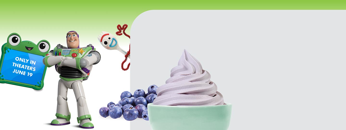 Yogurtland frozen yogurt alongside blueberries